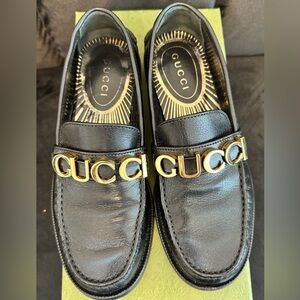 Gucci Black Leather Loafers with Gold Logo